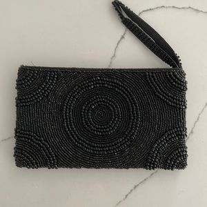 Black beaded clutch.
